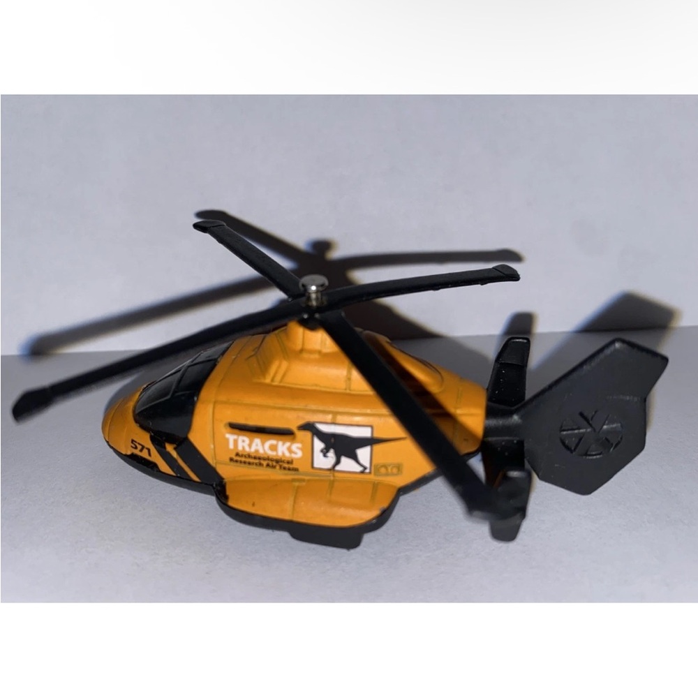 Matchbox Sea Rescue 2008 Dino Mountain Helicopter Tracks Orange